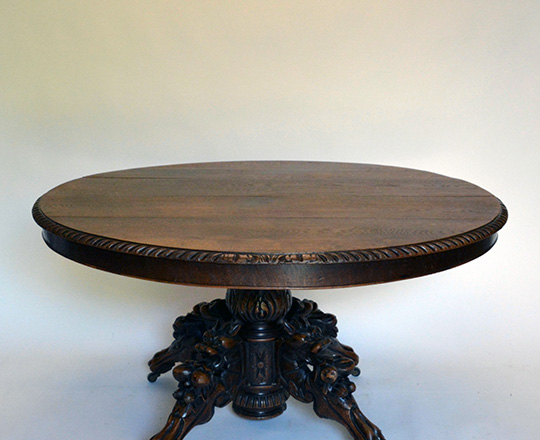 Lot 109: 19th cent oval Henri ll oak dining table with richly carved base with 2 extra leaves.H71xW130xD114cm.(open 190cm)