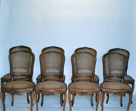 Lot 163: Set of Six caned Louis XV country chairs with X stretcher along with six leather cushions.