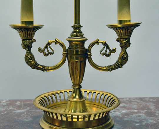 Lot 171_1: Early cent gilt bronze Empire two light 'Bouillotte' table lamp with red painted metal lampshade. H58cm.