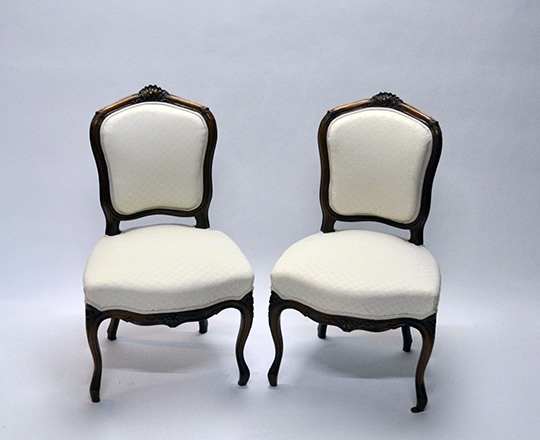 Lot 173: Pr Louis VX light cream color fabric finely carved chairs.