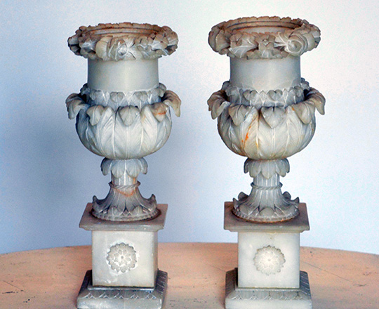 Lot 184: Pair 19th cent Charles X finely sculpted alabaster vases. (acc.) H25,5cm.