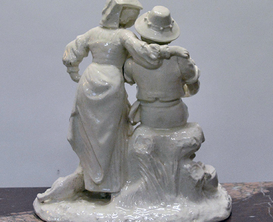 Lot 191_1: Turn cent, white varnished ceramic statue of couple with child. H 36cm.