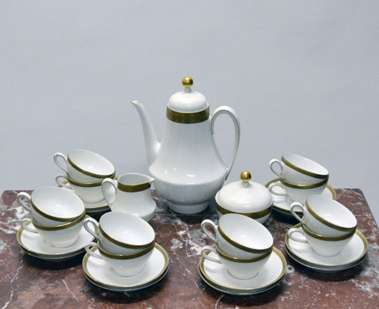 Lot 307: Tea / coffee white/gold porcelain set with 12 cups & saucers. Limoge like, German manuf.