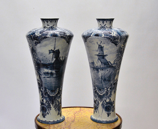 Lot 343: Large pair of blue / white Delft faience vases with typical Duch country scenes. H48cm.