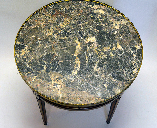 Lot 351_2: Louis XVI style low ''Bouillotte'' marble top center table with two drawers & side tablets. H57,5 x dia.65cm.