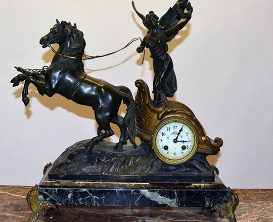 Lot 361_1: Fairly large bronze wash spelter mantle clock; ''Victort'' racing with horses on a chariot. F.Moreau. H51xW545cm.