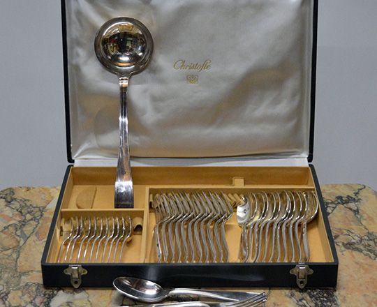 Lot 441: Christofle silver plated cutlery set including 12 large forks & spoons, 12 desert spoons and a large ladle in original casing.