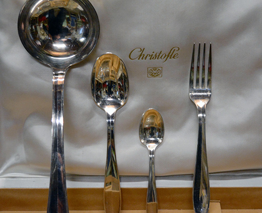 Lot 441_1: Christofle silver plated cutlery set including 12 large forks & spoons, 12 desert spoons and a large ladle in original casing.