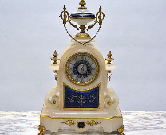 Lot 467: 19th c, Nap.lll cream color alabaster mantle clock. H37cm.