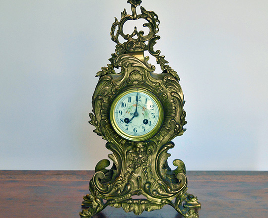 Lot 480: 19th cent Louis XV gilt bronze mantel clock. H 47cm.