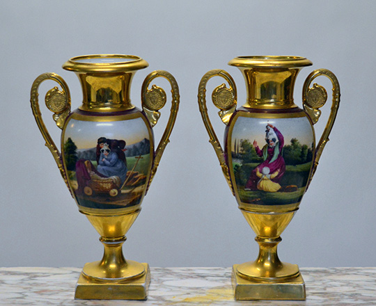 Lot 583: Pair 19th cent gilt porcelain vases with paited family scenes. H 30cm.