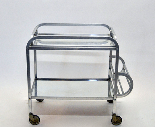 Lot 596_1: Art Deco aluminium bar cart on wheels with removable tray. (acc. on bottom mirror) H76xW72xD40cm.