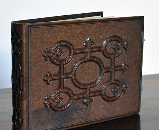Lot 60_1: Two 19th cent leather bound photo albums. 21X25cm & 16x22cm.