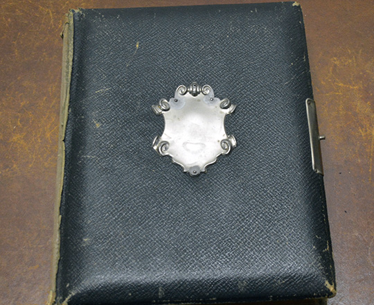 Lot 62_1: 19th cent large green leather bound photo album (with photos).