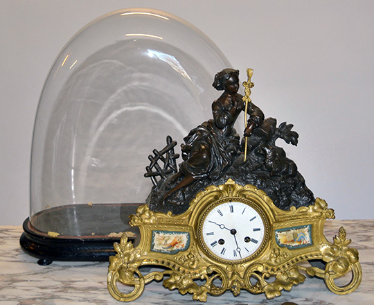 Lot 73_1: 19th c. double patina, gilt base and bronze wash spelter mantle clock with statue of lady. H33 x W38cm.