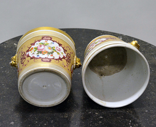Lot 93_1: Pr 19th cent Nap.lll plant vases with floral and gilt decor. H14,5x dia.14,5cm.